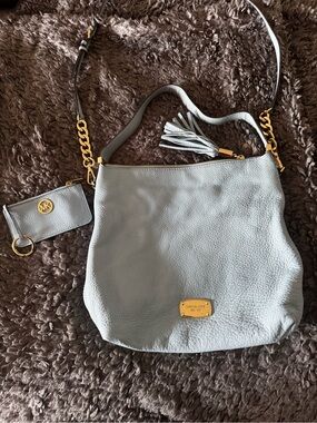 2pc Michael Kors Pebbled Leather Bag w/matching coin purse in light blue.